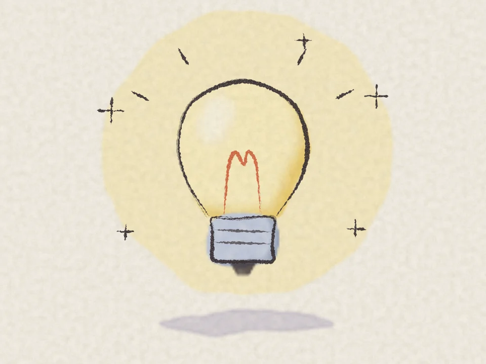 A pencil and watercolour drawing of a glowing light bulb surrounded by small sparkles.